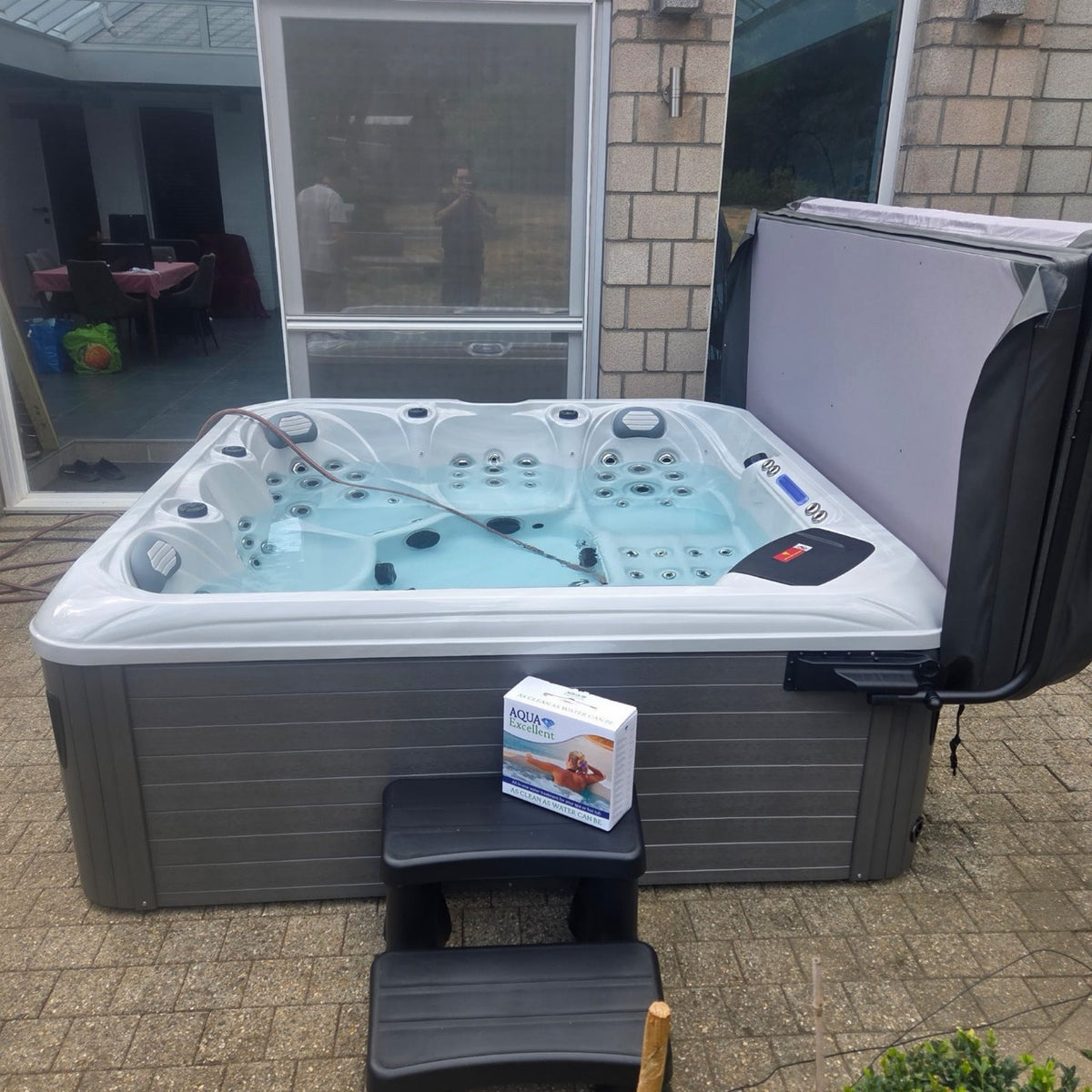 Spa installé près d’une véranda